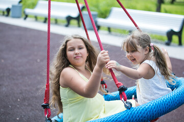 parent and child on swing