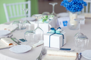 wedding bomboniere at a banquet, boxes with ribbons