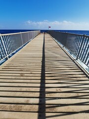 wooden bridge over the sea