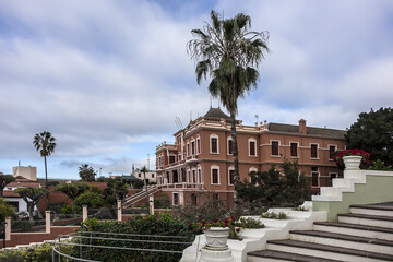 Fototapeta premium XIX century La Orotava public Victoria Gardens (Jardines Victoria): numerous water fountains, terraced gardens with colorful flowers and marble mausoleum. La Orotava, Tenerife, Canary Islands, Spain.