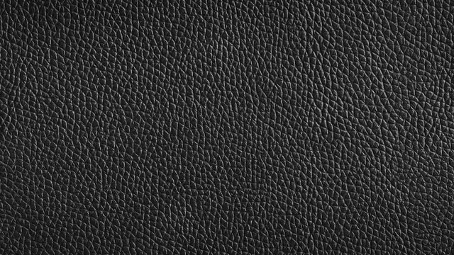 dark black leather background close-up. beautiful mockup for copy space. dolly camera movement