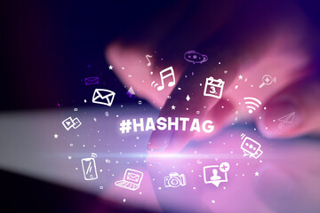 Finger touching tablet with social media icons concept concept