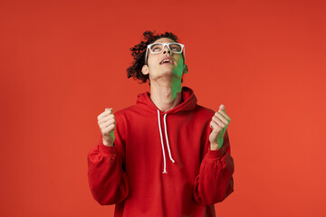 guy in red sweater posing heart holiday isolated background