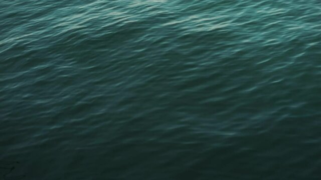 beautiful view of the sea water in calm. Tranquil ocean wawes in slow motion