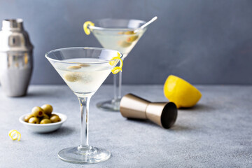 Classic lemon drop martini with olives and lemon - obrazy, fototapety, plakaty