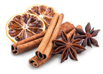 Cinnamon sticks, Anise stars, Dried citrus Lemon slice. Aromatic spices for Drink, cooking or baking. Isolated white background. Macro High resolution photo. Professional food photography. 
