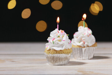 birthday cupcakes on wooden table