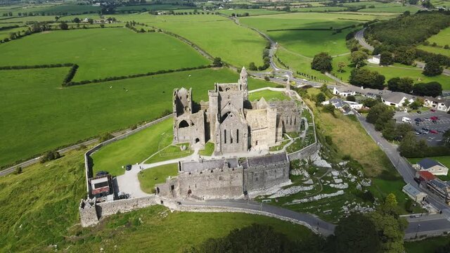 Drone rotation around Rock of Cashel, ruined castle in Ireland.