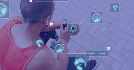 Animation of interface icons processing data over male athlete with prosthetic leg using smartwatch - Powered by Adobe