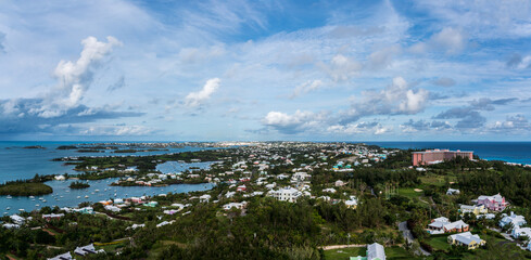 Bermuda's Coastal Symphony: Where azure waters meet vibrant skies, lush landscapes cradle charming...