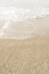 soft warm gentle wave of water and sand