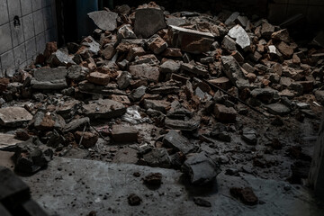 The rubble, A pile of smashed cement stacked together of Deteriorated abandoned old building, Destroyed building, Selective focus.