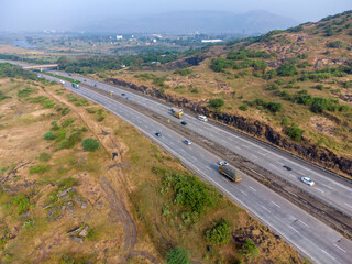 Aerial footage of the Mumbai-Pune Expressway near Pune India. The Expressway is officially called...