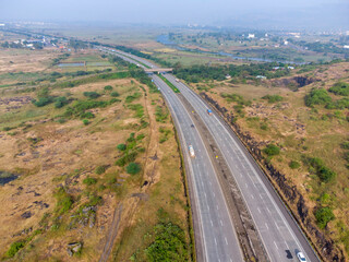 Aerial footage of the Mumbai-Pune Expressway near Pune India. The Expressway is officially called the Yashvantrao Chavan Expressway.