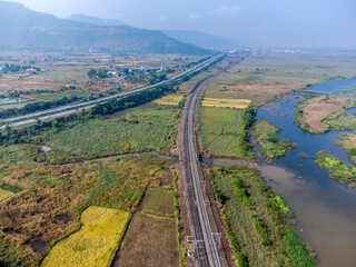 Aerial footage of the Mumbai-Pune Expressway near Pune India. The Expressway is officially called the Yashvantrao Chavan Expressway.