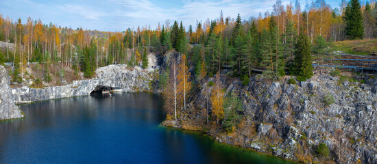 Panorama of the Marble Canyon in golden autumn. Ruskeala, Karelia