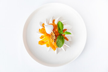 Meringue cake Pavlova with fresh mango