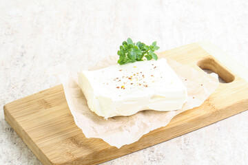 Greek Feta cheese over board