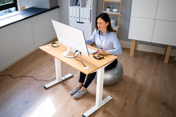 Obraz na płótnie Canvas Correct Posture At Desk In Office