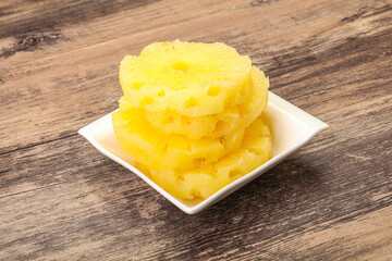 Sweet pineapple rings in the bowl