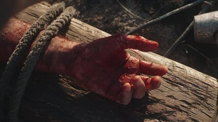 Crop executioner crucifying Jesus Christ