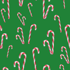 Christmas seamless pattern with hand drawn red candy cane on green background. Seamless pattern with watercolor candies and lollipops. Illustration for wrapping paper, fabric, greeting cards design.