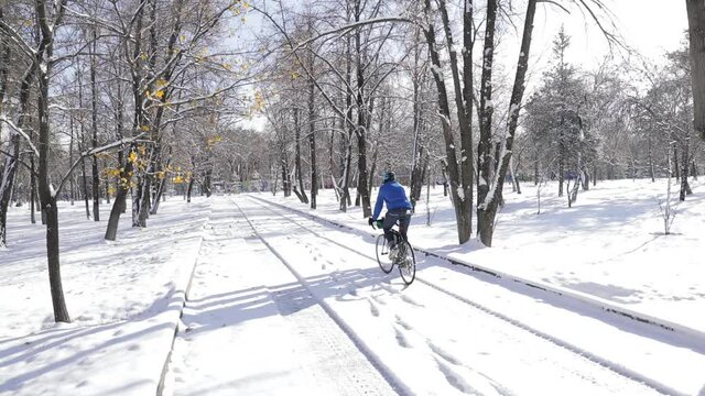 Winter urban biking in snowy city