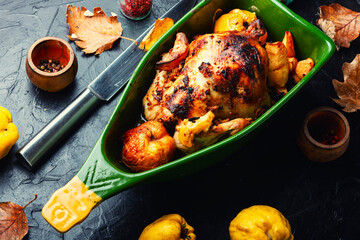 Whole chicken baked with quince
