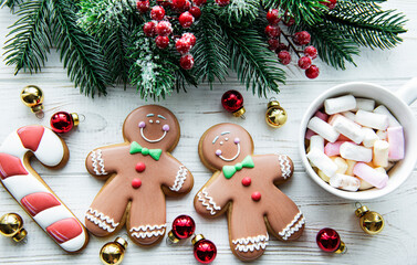 Christmas background with cocoa and gingerbread cookies.