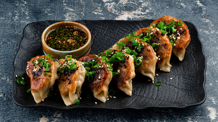 Traditional japaneese gyoza with meat, dumplings snack. Fried dumplings Gyoza in plate - 467513434