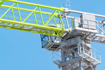 construction crane at blue sky as background