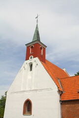 Church tower of the Karleby Kirke in Nykøbing on the island Falster. Denmark