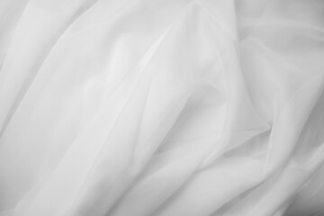 Fototapeta na wymiar White fabric texture background. White tulle drapery.