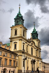 Fototapeta na wymiar Front view of the Holy Cross Church in Warsaw, Poland