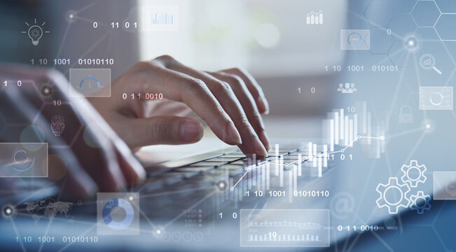 Data scientists. Business Intelligence, software development. Woman programmer using laptop analyzing various information on futuristic virtual interface screen