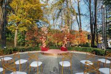 Wedding autumn ceremony arch. Floral decoration design