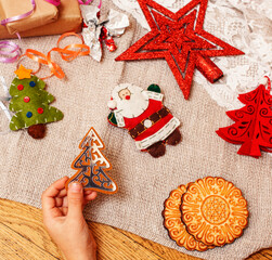 lot of stuff for handmade gifts, scissors, ribbon, paper with countryside pattern, ready for holiday concept, nobody home close up