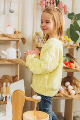 Happy smiling children playing together with wooden eco toys. Friendship,children activity