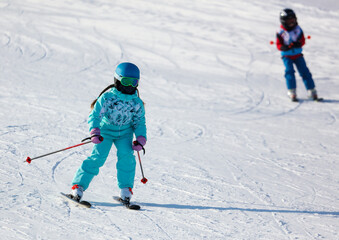 A man is skiing in the snow