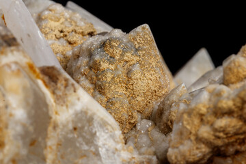 Macro mineral stone Snow quartz with calcite on a black background