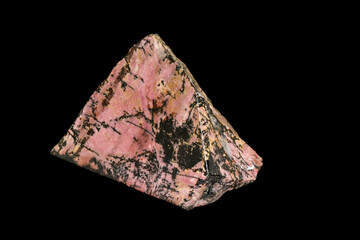 Macro stone Rhodonite mineral on a black background
