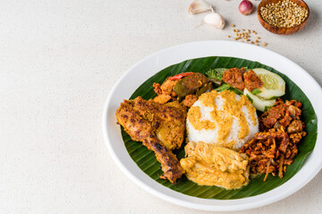 Nasi Padang with  chicken rendang  is an Indonesian food from West Sumatra in Indonesia.
Nasi Padang Chicken Roast as favorites food for Indonesian people.