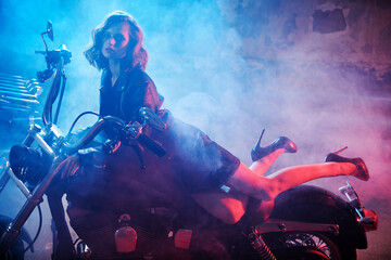 Plakat seductive lady on a bike