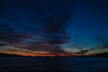 Fototapeta na wymiar red and orange sunset over the sea