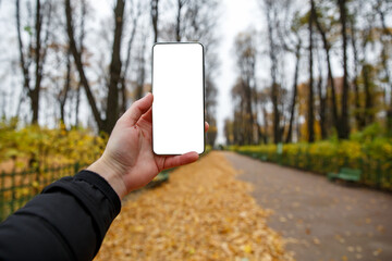 Using smartphone outdoor mockup.