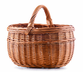 Obraz premium Empty wicker basket isolated on white