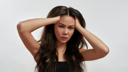 Fototapeta premium Portrait of young Asian woman model in studio