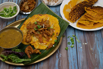 Vegan, gluten free flour panckakes served with roasted seitan pieces and side dishes