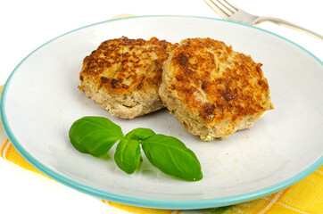 Two cutlets of minced meat on plate