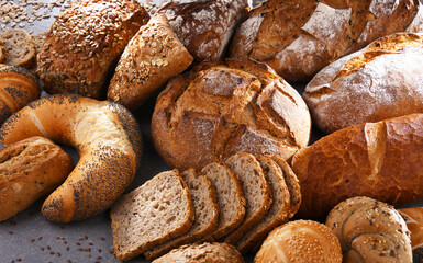 Assorted bakery products including loafs of bread and rolls